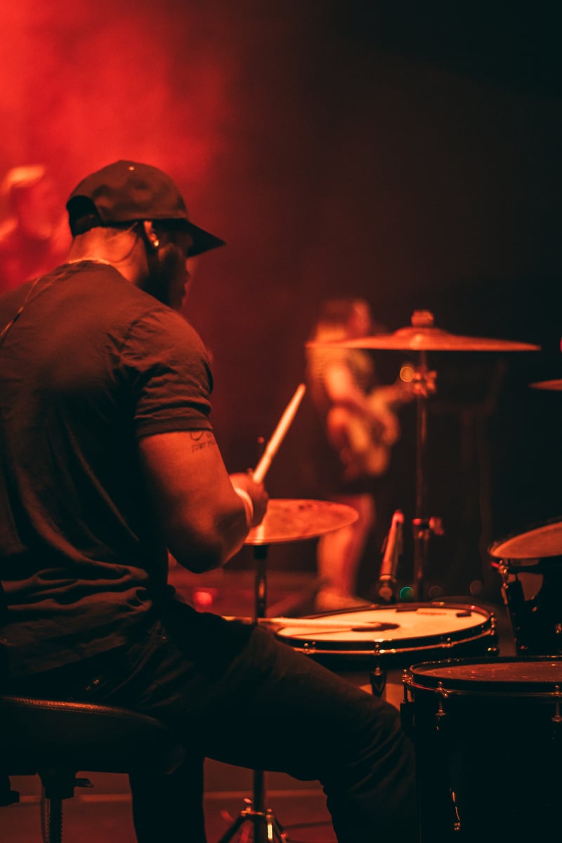 Man's Wearing Black Shirt Playing Drum